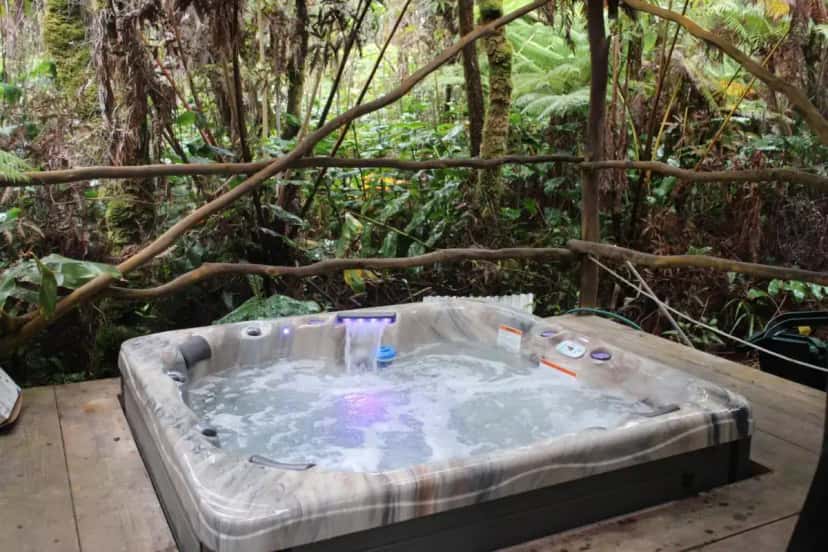 Private outdoor hot tub at Hale Kumu La'au- A'a in Volcano, HI