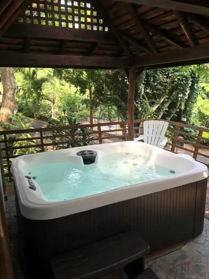 a hot tub under a gazebo at Hale Maluhia Country Inn in Kailua-Kona
