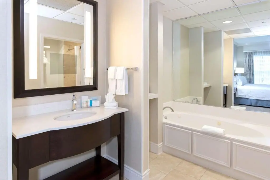 Private in-room jacuzzi tub in the Deluxe King Room with Whirpool - Non-Smoking at Hampton Inn & Suites Charlotte/South Park