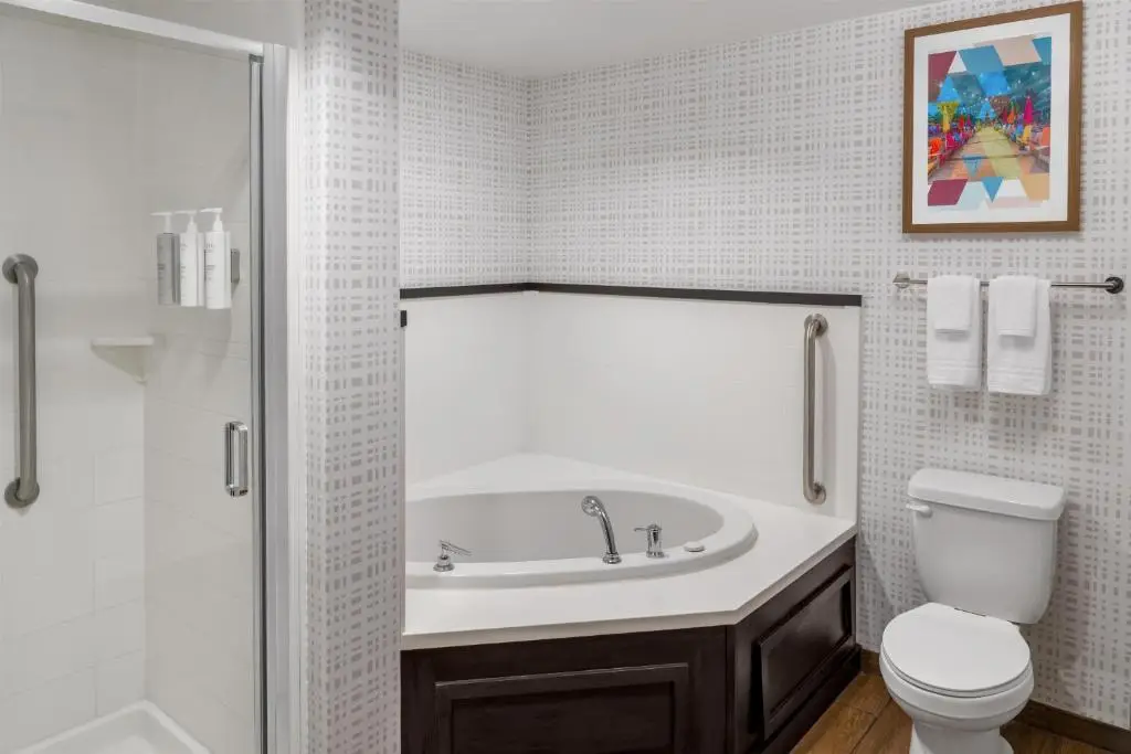 Private in-room jacuzzi tub in the King Studio Suite with Spa Bath at Hampton Inn & Suites Coconut Creek
