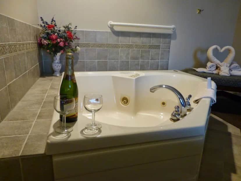 Private in-room jacuzzi tub at Hearthstone Inn & Suites