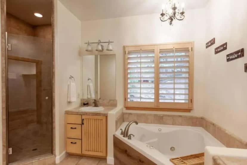 In-room jacuzzi tub at Hillside Hideaway - game rm - master spa - Luxury in Lake Arrowhead, CA