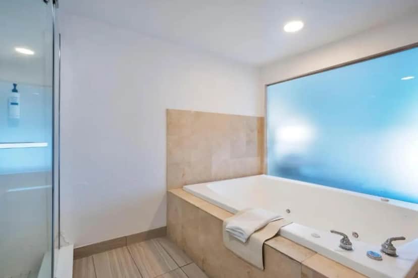 Private in-room jacuzzi tub in the King Suite with Whirlpool at Hilton Garden Inn Jacksonville Airport