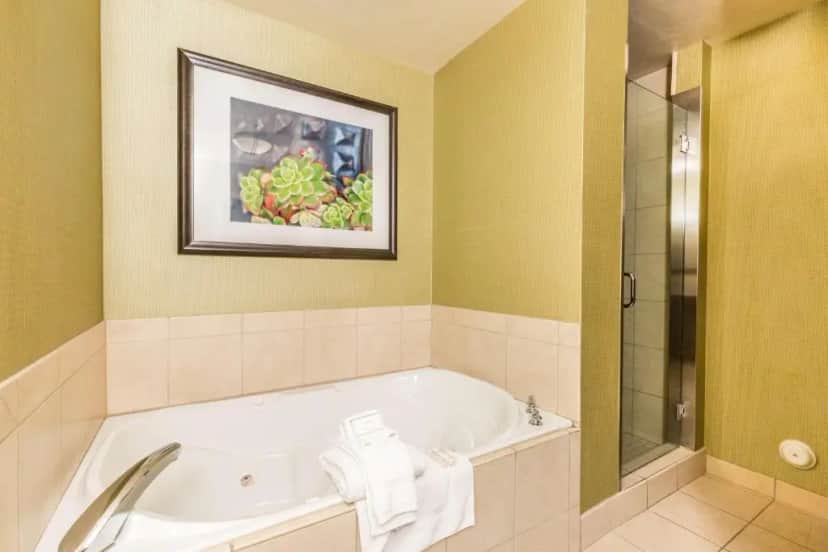 Private in-room jacuzzi tub in the One-Bedroom King Suite with Whirlpool and Sofa Bed at Hilton Garden Inn St. George