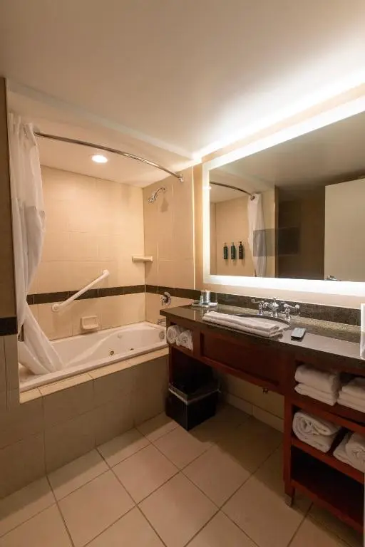 Private in-room jacuzzi tub in the Superior King Corner Room with Oceanfront View and Balcony at Hilton Virginia Beach Oceanfront