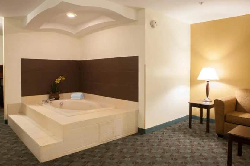 Private in-room jacuzzi tub in the King Room with Jetted Tub at Holiday Inn Express & Suites Canton, an IHG hotel