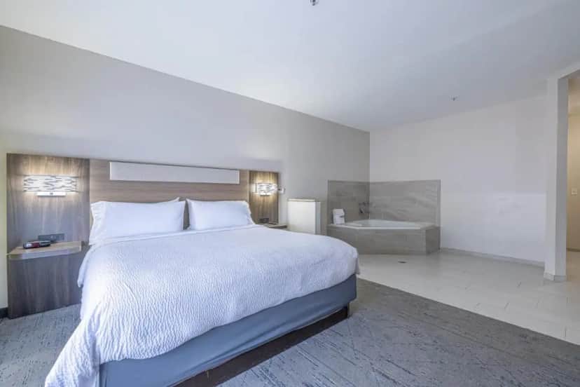 Private in-room jacuzzi tub in the One-Bedroom Suite with Jetted Tub - Mobility and Communications Access