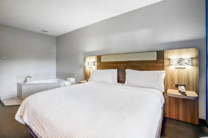 Private in-room jacuzzi tub in the King Suite with Spa Bath at Holiday Inn Express & Suites Jacksonville - Atlantic Beach By IHG