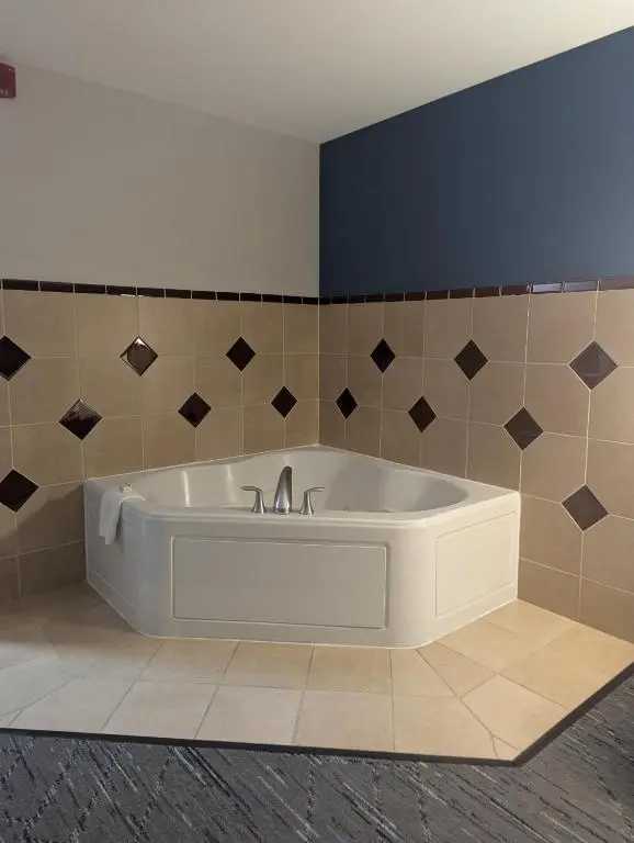 Private in-room jacuzzi tub in the King Suite with Jetted Tub at Holiday Inn Express & Suites Loveland