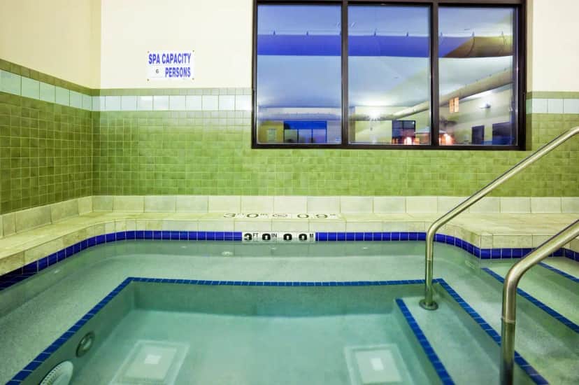 Shared indoor hot tub at Holiday Inn Express & Suites Madison-verona By IHG