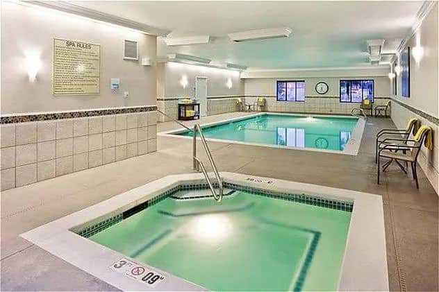 Shared indoor hot tub at Holiday Inn Express & Suites Puyallup (Tacoma Area), an IHG hotel