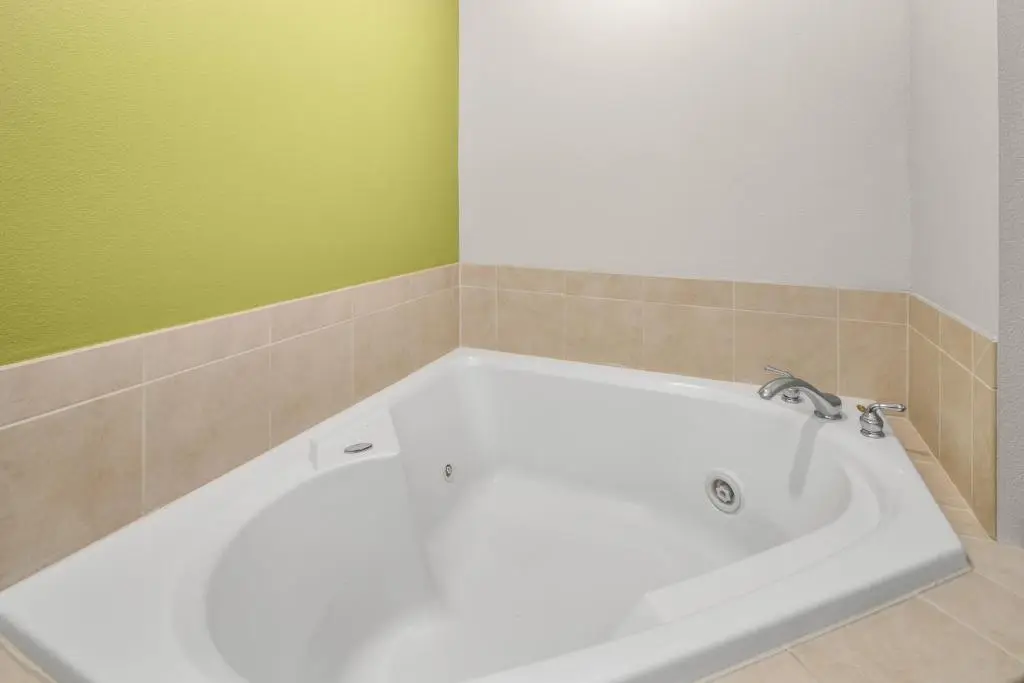 Private in-room jacuzzi tub in the Deluxe King Suite at Holiday Inn Express & Suites Wilmington-Newark