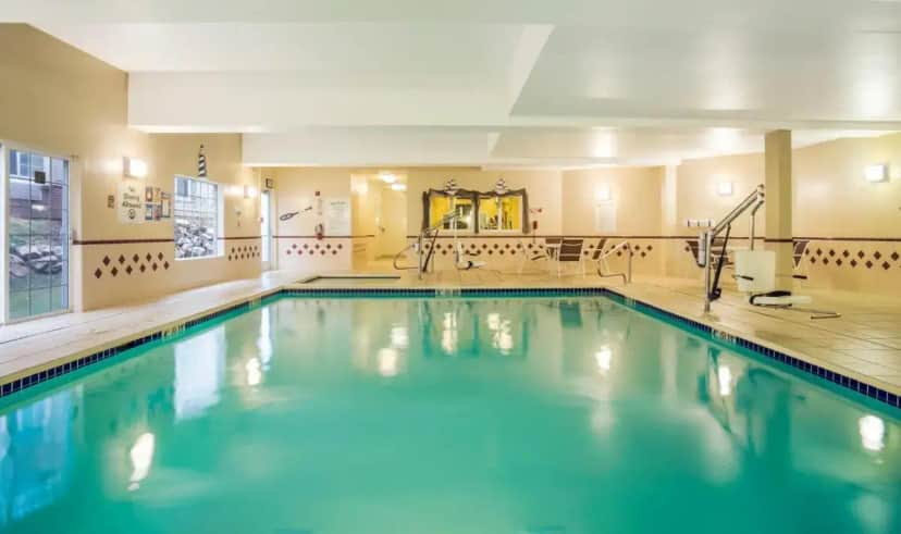 a swimming pool in a hotel room at Holiday Inn Express Layton - I-15 by IHG in Layton