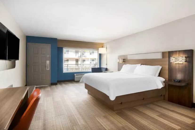 a hotel room with a bed and a desk at Holiday Inn Express Simi Valley by IHG in Simi Valley