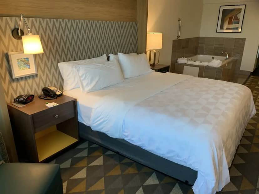 Private in-room jacuzzi tub in the Standard Room, 1 King Bed, Jetted Tub at Holiday Inn Martinsburg