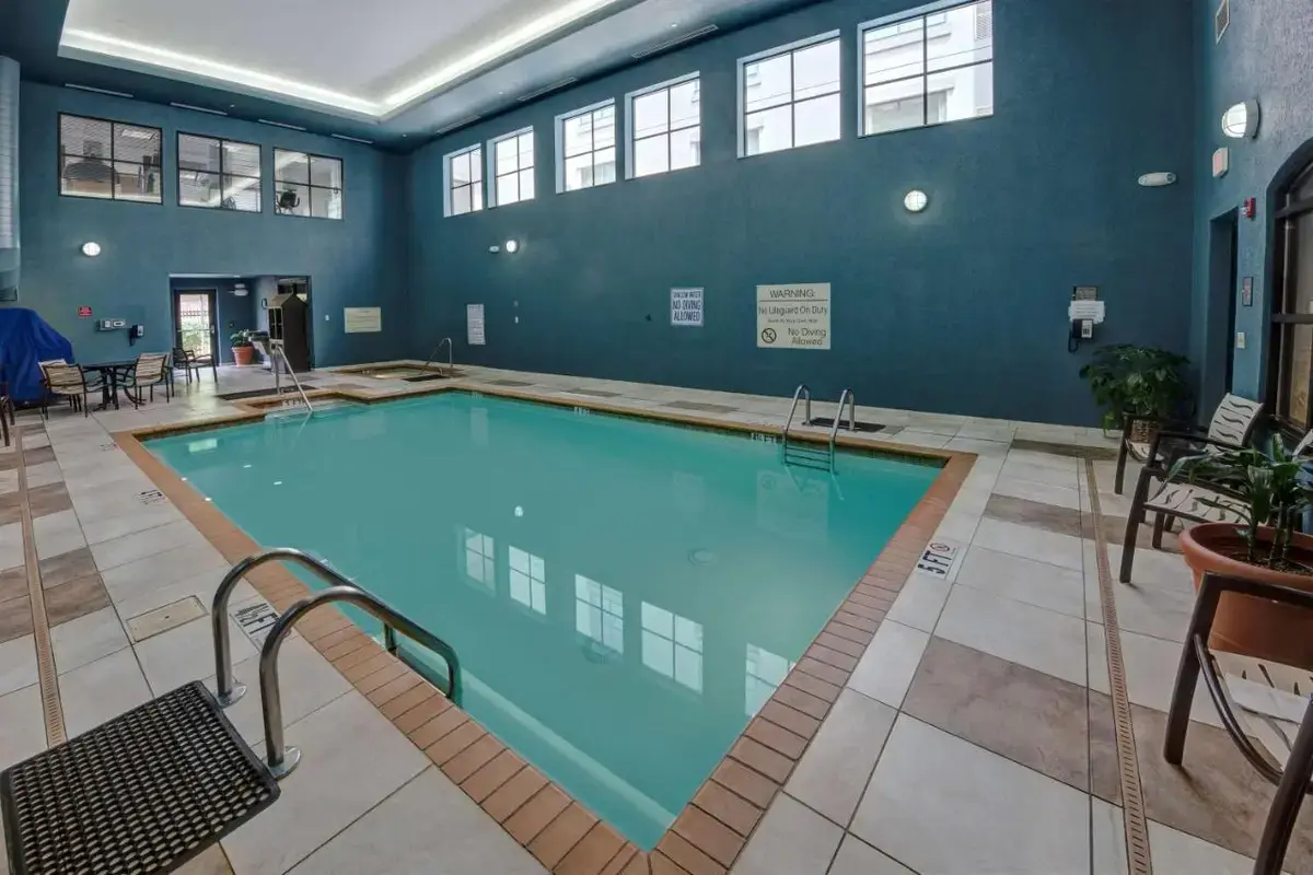 a large swimming pool in a large room at Homewood Suites by Hilton Asheville in Asheville