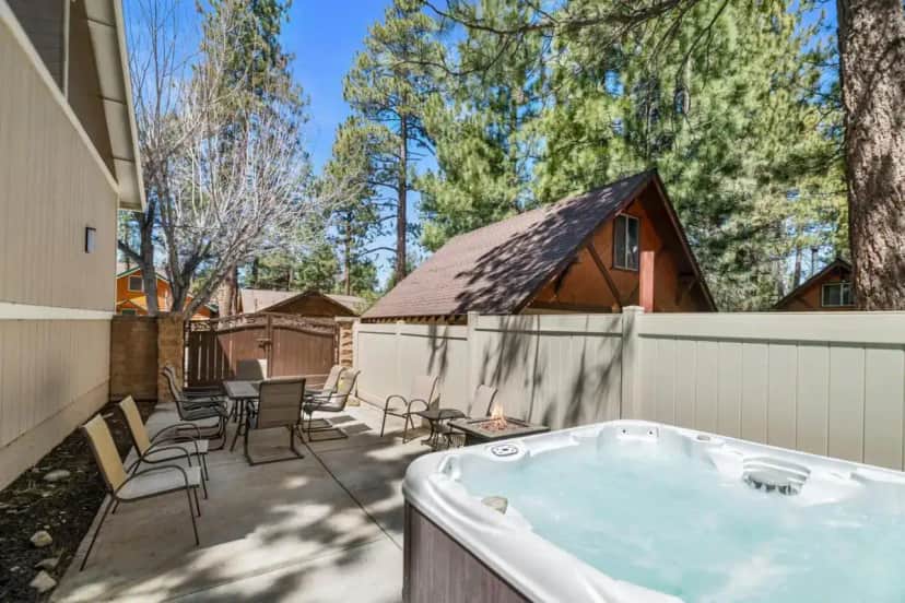 a hot tub in the backyard of a house at Hummingbird Corner AC, Pet Friendly, Great Location, Jacuzzi in Big Bear Lake