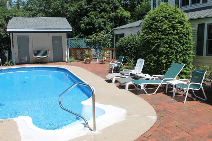 Shared indoor hot tub at Inn At Ellis River in Jackson, NH