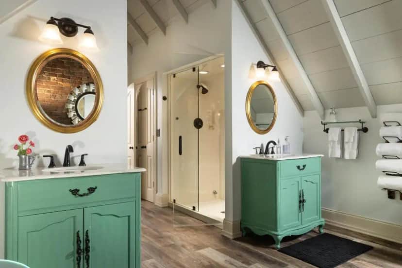 a bathroom with two sinks and a mirror at Inn at Woodhaven-In the Heart of the Bourbon Trail-Over 12 Distilleries Nearby in Louisville