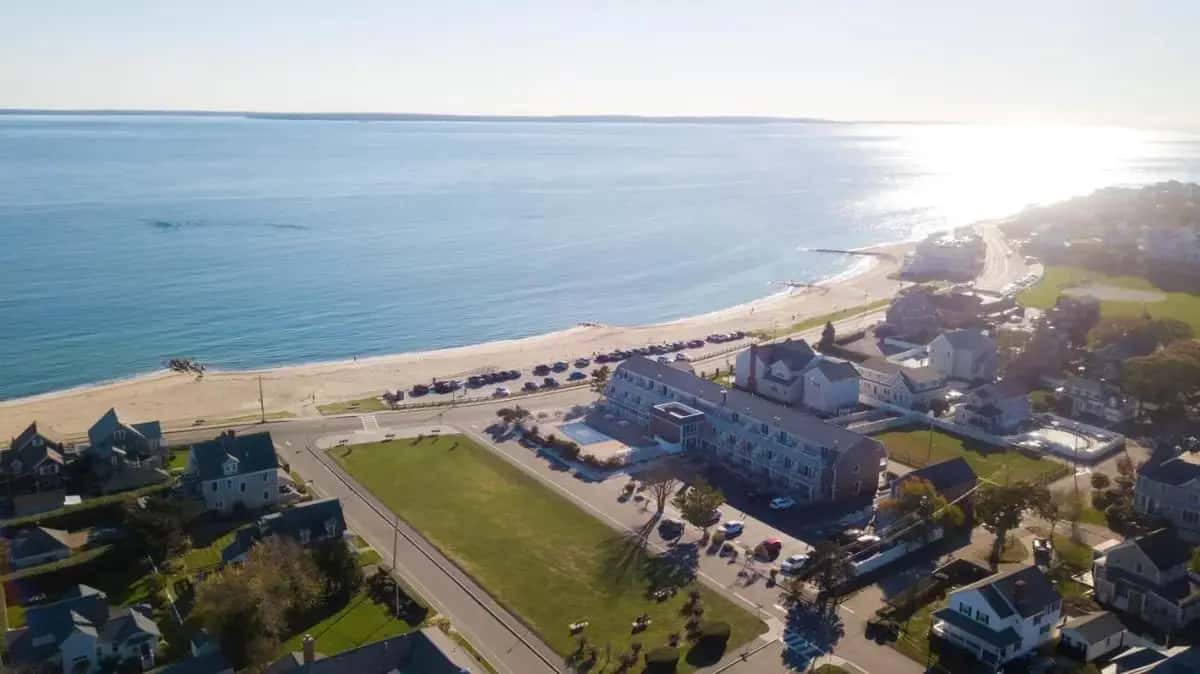 an aerial view of a beach and the ocean at InnSeason Resorts Captain's Quarters in Falmouth