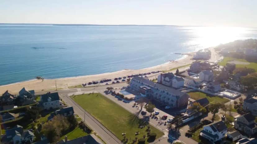 an aerial view of a beach and the ocean at InnSeason Resorts Captain's Quarters in Falmouth