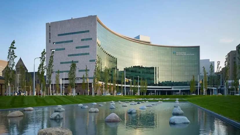 a large building with a pond in front of it at InterContinental Cleveland by IHG in Cleveland