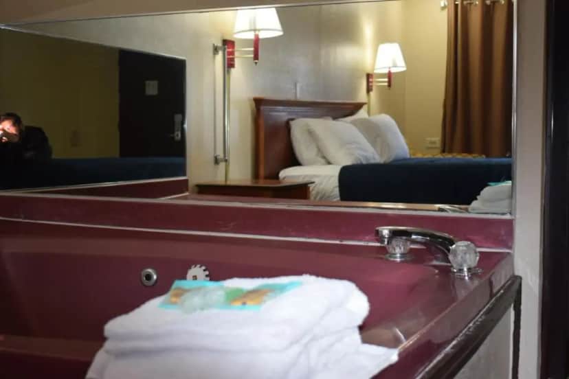 Private in-room jacuzzi tub in the Premium King Bed Non-Smoking with Jetted Tub at Knights Inn Farmington Hill
