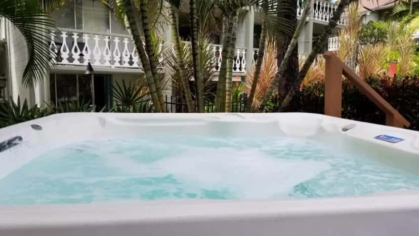 Shared outdoor hot tub at Kona Islander Inn - Prime Downtown Location with Hot Tub, Pool & Beach in Holualoa, HI