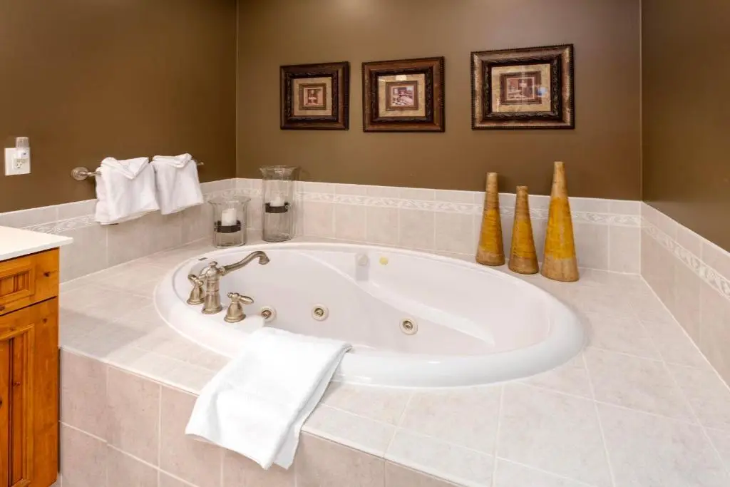 Private in-room jacuzzi tub in the King Suite with Balcony at Larsmont Cottages