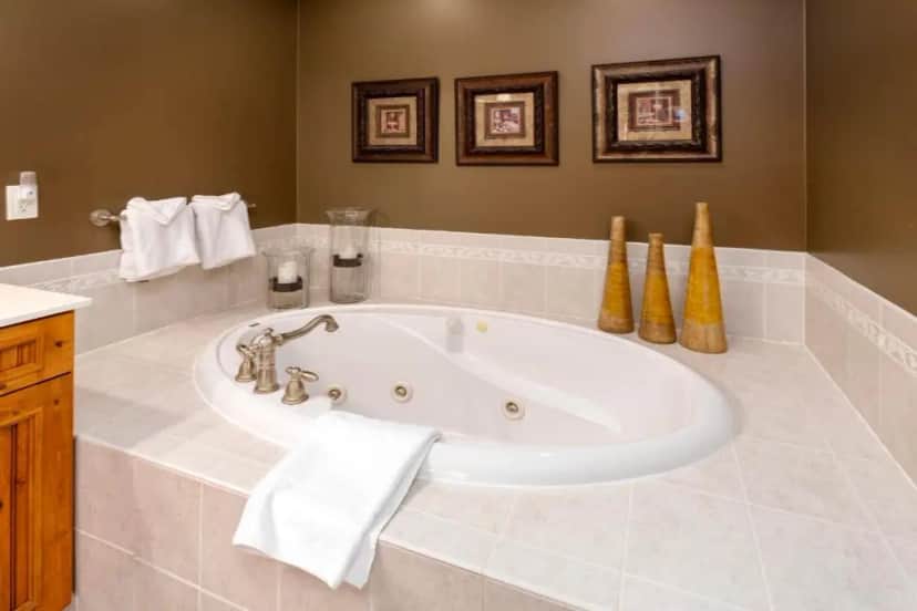 Private in-room jacuzzi tub in the King Suite with Balcony at Larsmont Cottages