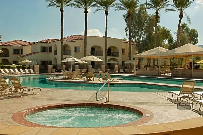 Shared outdoor hot tub at Legacy Golf Resort