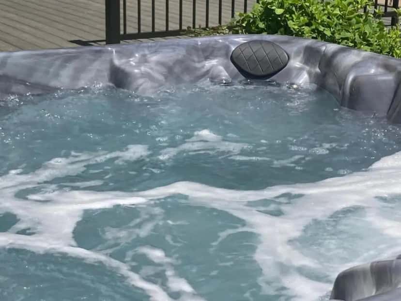 Private outdoor hot tub at Lux Home 5 min to Train and Airport in West Chester, OH