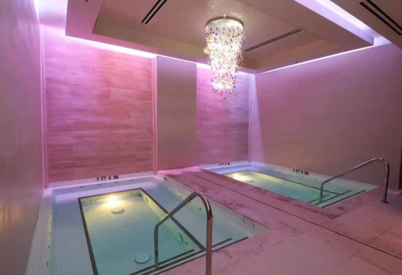 a hot tub in a room with a chandelier at M Resort Spa & Casino in Las Vegas