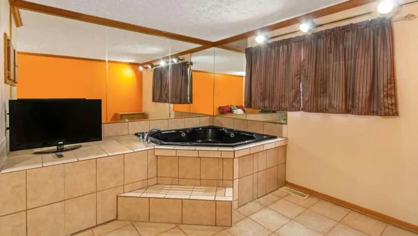 Private in-room jacuzzi in the Queen Room with Spa Bath at Magnuson Hotel Extended Stay Canton Ohio