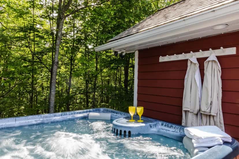 Private outdoor hot tub at Maple Hill Farm Inn and Conference Center in Hallowell, ME
