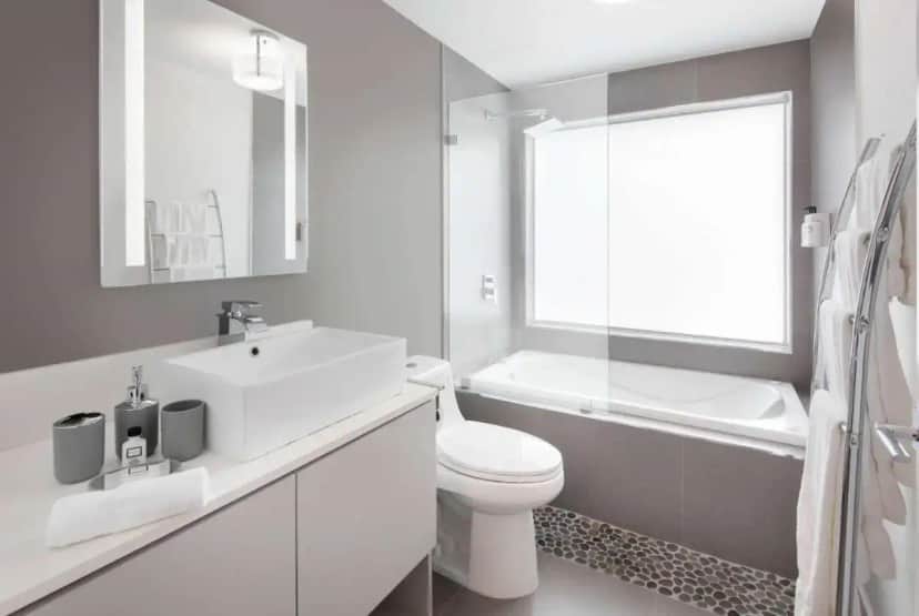 a white bathroom with a sink and a toilet at MB Hotel, Trademark Collection by Wyndham in Miami Beach