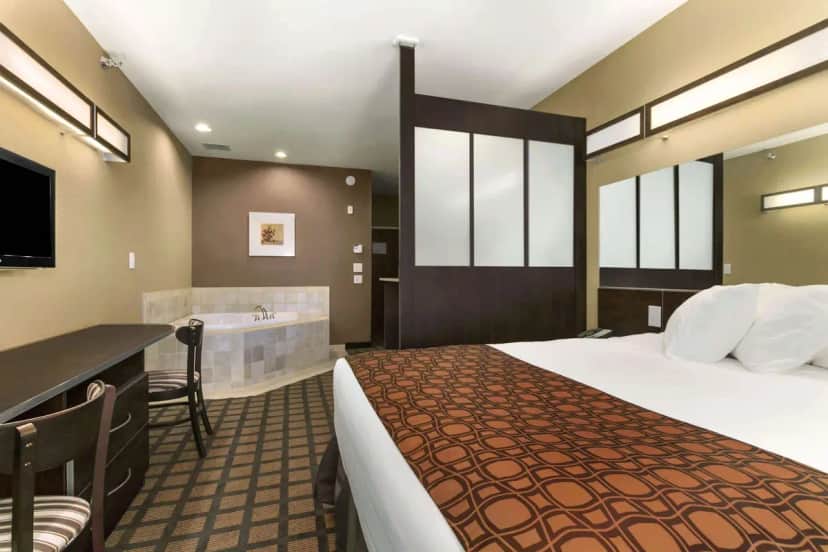 Private in-room jacuzzi tub at Microtel Inn & Suites by Wyndham Minot