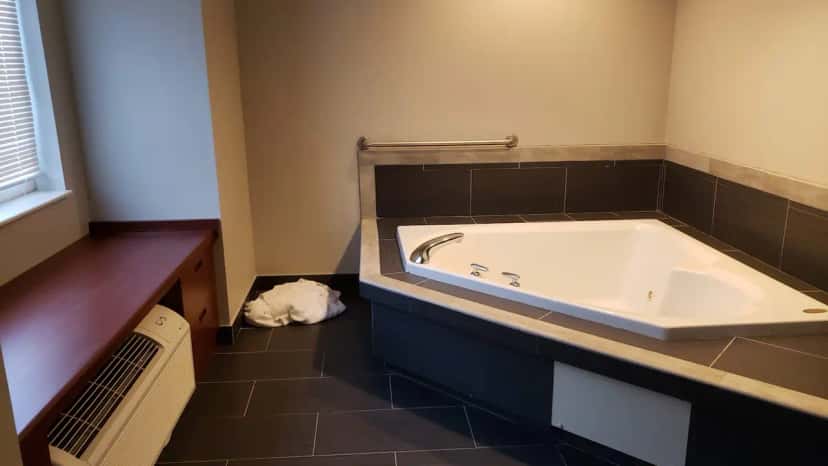 In-room jacuzzi tub at Microtel Inn & Suites by Wyndham Urbandale/Des Moines in Urbandale, IA