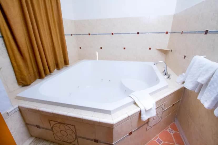 Private in-room jacuzzi tub in the Double Room with Spa Bath at Mission Bell Motel