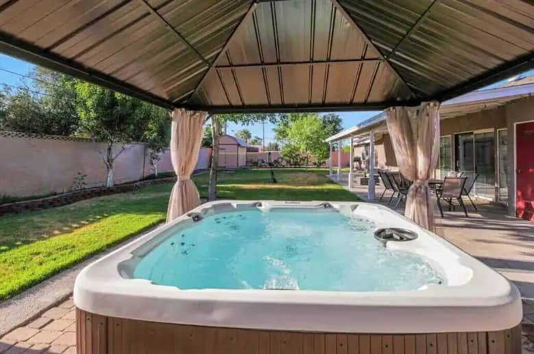 Private in-room jacuzzi at Modern Farmhouse Villa with Theater Room and Hot Tub