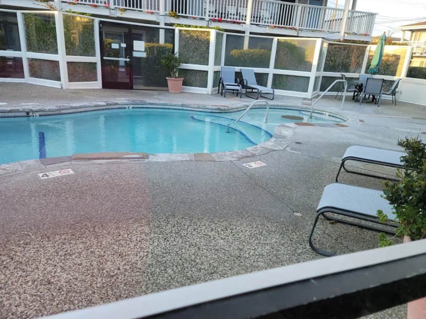 Shared outdoor hot tub at Monterey Bay Lodge