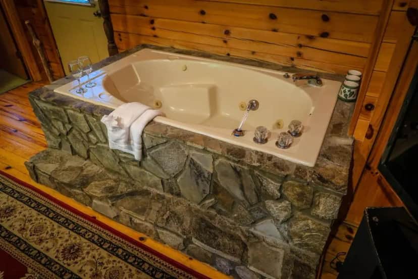 Private in-room jacuzzi tub in the Cottage with Garden View at Mountainaire Inn and Log Cabins