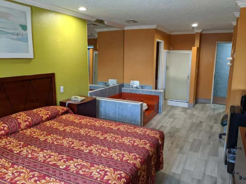In-room hot tub at Passport Inn & Suites in Corona, CA