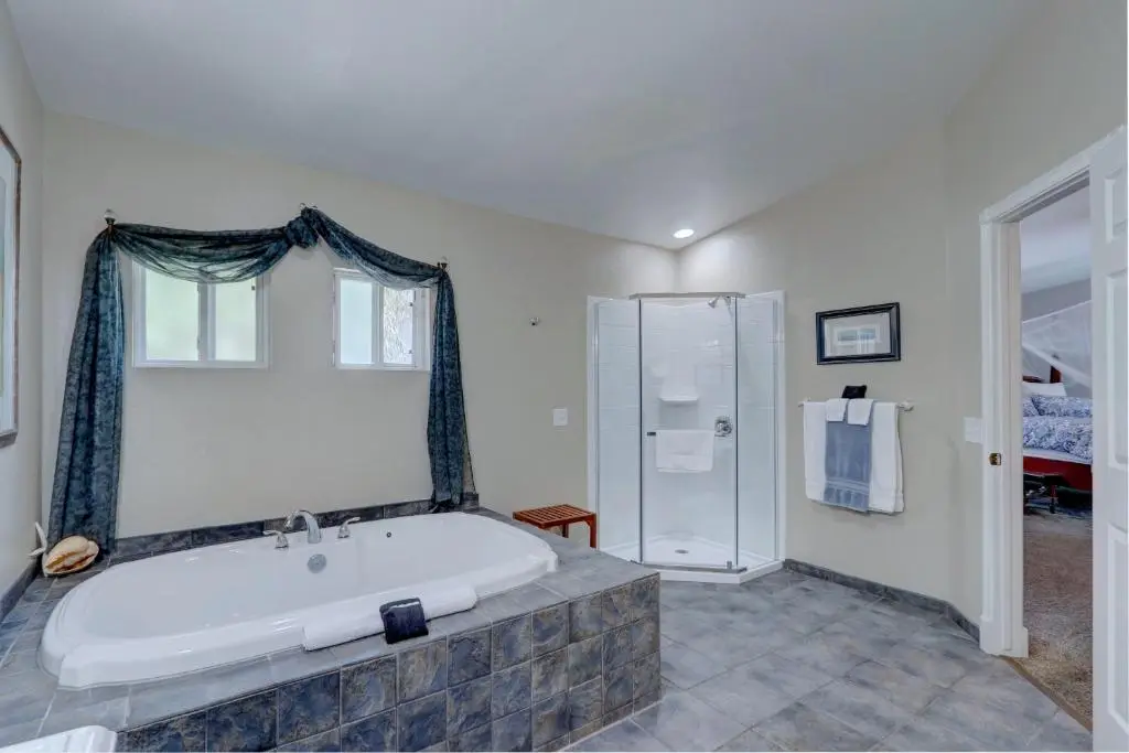 Private in-room jacuzzi tub in the King Suite with Spa Bath at Pelican Cove Inn