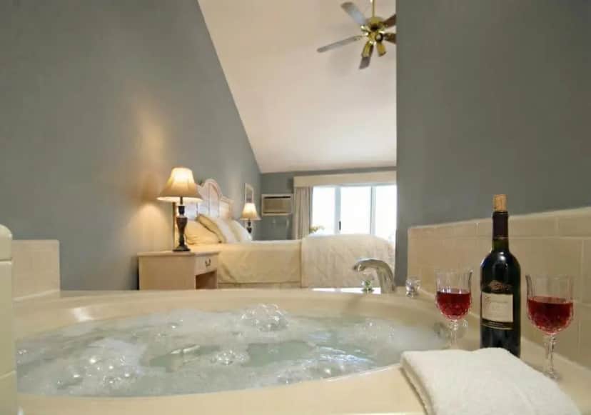 Private in-room jacuzzi in the King Bed - Bay View - 2 Person Spa Tub at Pointes North Beachfront Resort Hotel