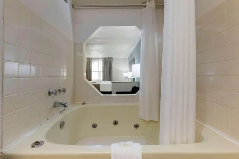 Private in-room jacuzzi tub in the King Suite with Whirpool - Non-Smoking at Quality Inn Alexis Rd