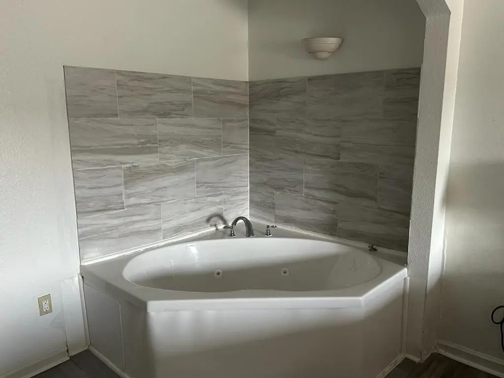 Private in-room jacuzzi tub in the Efficiency King Suite with Whirlpool - Non Smoking at Quality Inn & Suites Decatur Priceville I-65