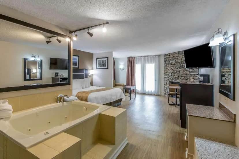Private in-room jacuzzi in the King Suite with Spa Bath and Wrap-Around Balcony at Quality Inn & Suites