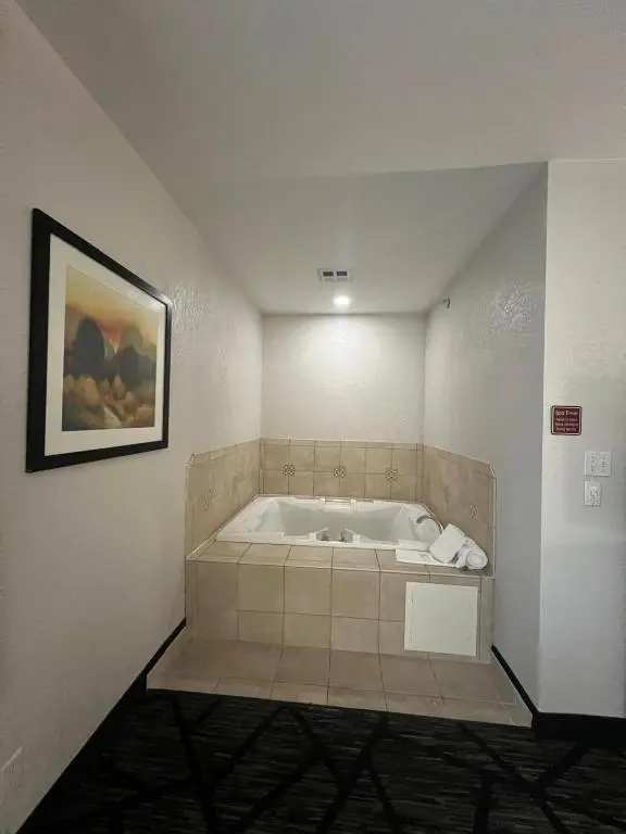 Private in-room jacuzzi tub in the King Suite with Hot Tub - Non-Smoking at Quality Inn & Suites Loveland