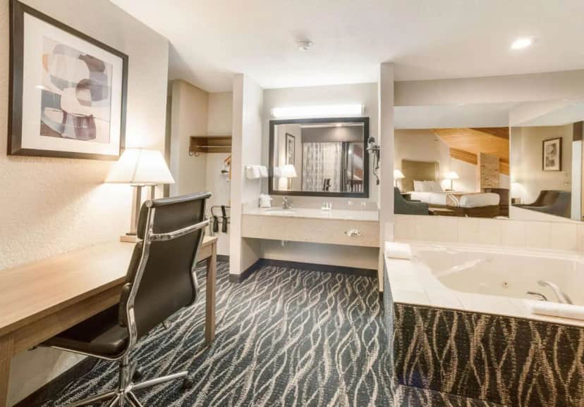 Private in-room jacuzzi tub in the King Suite with Spa Bath - Non-Smoking at Quality Inn